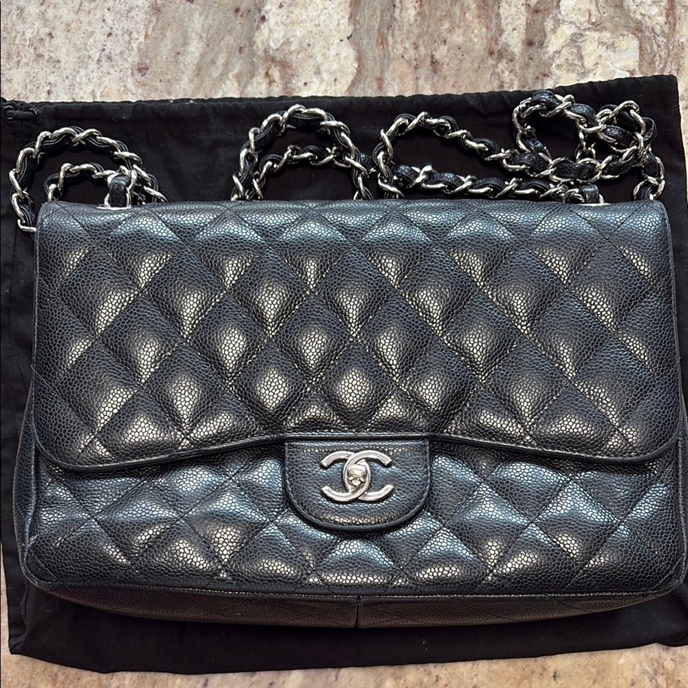 Jumbo Chanel Classic 2.55 double Flap in black caviar leather, silver hardware